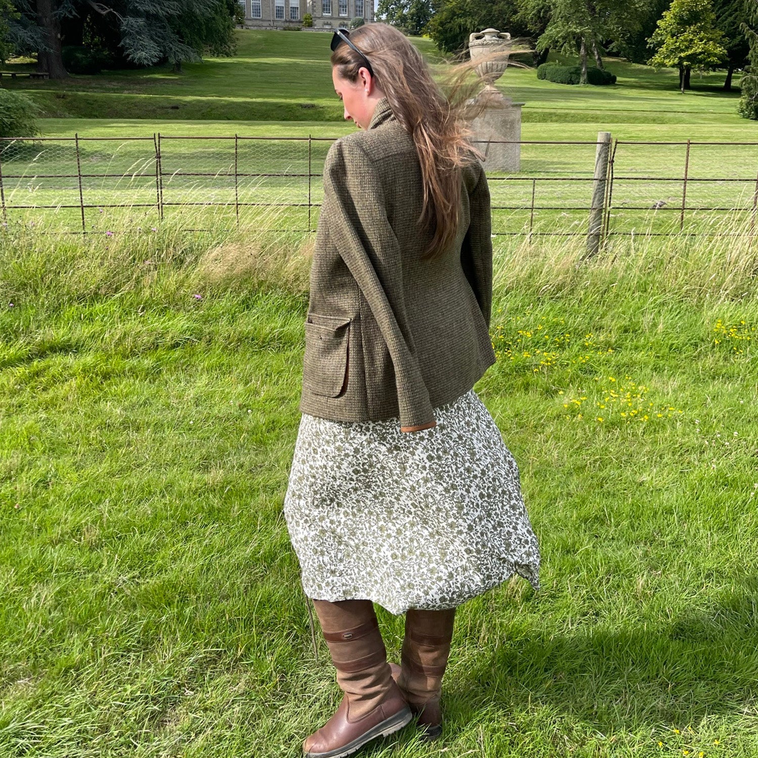 Bonnie Baker in a tweed jacket dress and sunglasses at the Game Fair event in Ragley Hall.//© Bonnie Baker