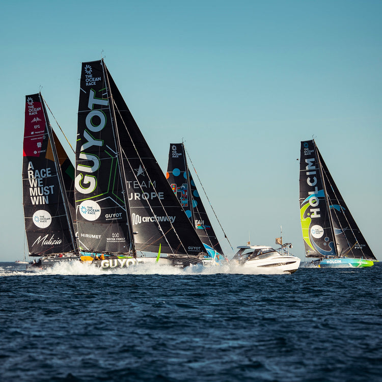 Square image of Teams Guyot, Holcim, and other boats in the water during the Ocean Race 2023.//© GUYOT environment - Team Europe | Charles Drapeau